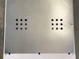 a close up of a metal box with four holes on it