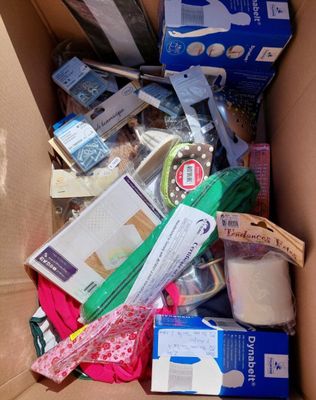 a cardboard box full of items that are in it