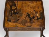 an old wooden tray with a painting of a street scene on it