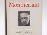 the front cover of a book with a picture of a man in glasses