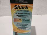 une boîte de « Shark Stainer » posée sur une table
