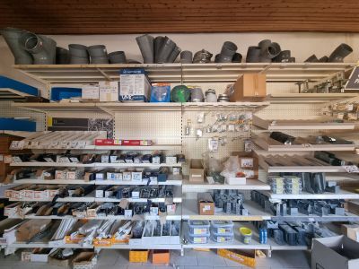 many shelves with various tools on them in a store