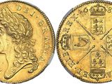 a gold sovereign coin with a crown on the front and a crown on the back