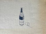 a drawing of a bottle of wine on a piece of paper
