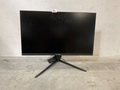 un écran d'ordinateur noir posé sur une table près d'un mur