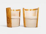 pair of art deco lounge chairs in birch and leather