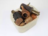 a white container filled with different types of tools