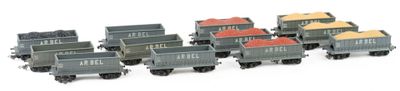 a lot of toy trains that are on a white surface