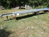 an image of a flatbed trailer parked in a field