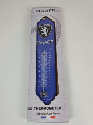 une image représentant un thermomètre dans une boîte posée sur une table