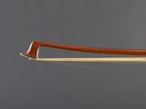 an image of a bow made from wood with a curved handle