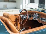 a close up of a car dashboard with a steering wheel