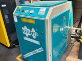 a blue machine that is sitting in a warehouse