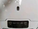 a white machine that is sitting on a table