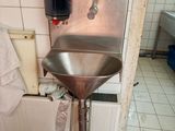 a bathroom with a sink and a toilet in it