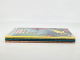 three children ' s books stacked on top of each other