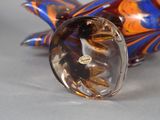 a close up of a glass object on a table