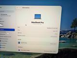 a computer screen with a macbook pro on it