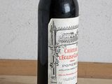 a bottle of wine that is sitting on a table