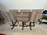 four pieces of wood sitting on the floor next to each other