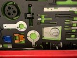 a picture of a red tool box with tools in it