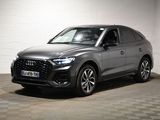 the new audi qx suv is parked in a garage