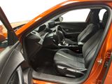 the interior of a car with the door open and the seat up
