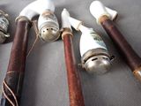 five different types of canes on a table