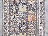a blue and white rug with a design on it