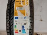 a close up of a tire with a sticker on it