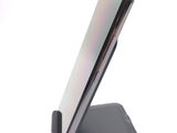 a close up of a cell phone on a stand