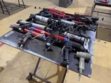 a lot of tools that are sitting on a table