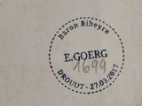 a close up of a plate with a name on it