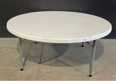 an image of a white table in a room