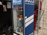a nocco vending machine in a garage