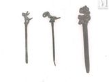 four different types of metal items are displayed on a white surface