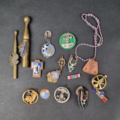 several different types of medals and other items on a table
