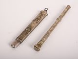 pair of antique silver plated pen and pencils on white background