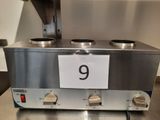 un panneau indiquant « 9 » sur le devant d'une machine