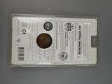a small coin in a plastic package on a table