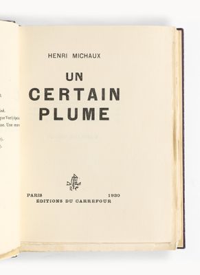 un livre ouvert dont la couverture est ornée d'une image de chat
