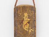 une petite boîte en bois entourée d'une corde