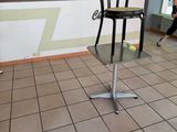 a chair that is sitting in the middle of a tiled floor