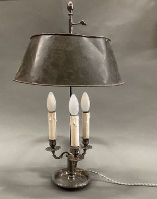 a lamp that is sitting on a table with a lamp on top of it