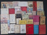 many books that are on the table together