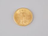 an image of a gold coin on a white surface