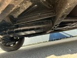 a close up view of a car ' s exhaust pipe and exhaust pipe