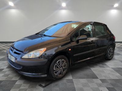 a picture of a black car parked in a garage