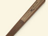 a piece of wood that is laying on the ground
