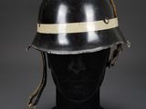 a black helmet with a white stripe on the side of it